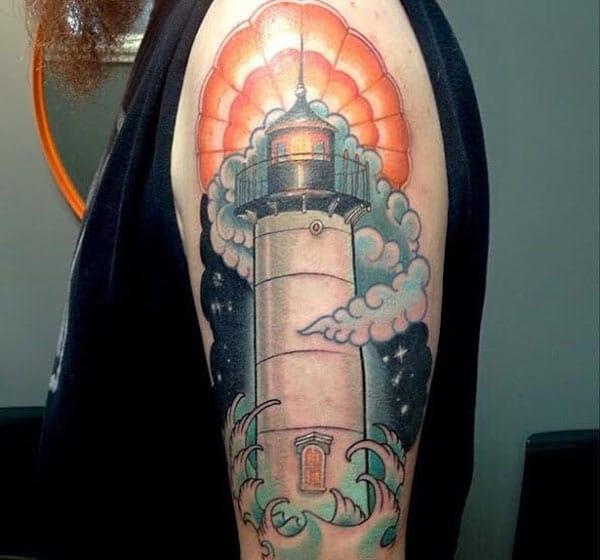 Men makes Lighthouse Tattoo on their shoulder to flaunt it