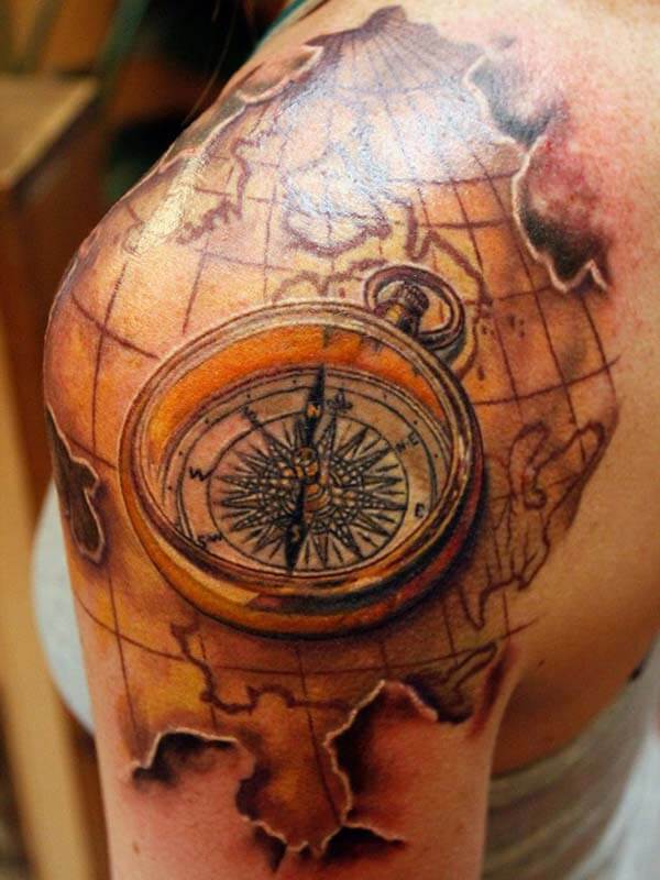 breathtaking map compass tattoo design on shoulder for women