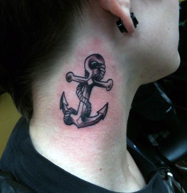 Anchor Tattoo behind the ear brings the feminist look