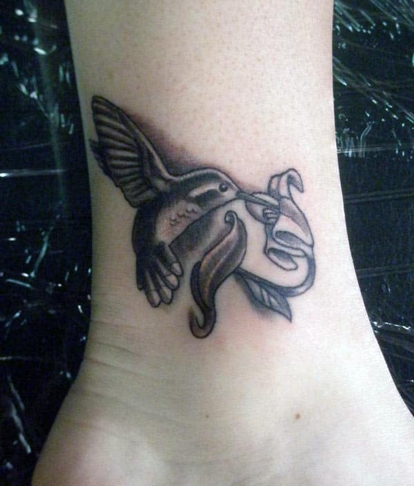 Ankle tattoo with a bird make a girl look classy