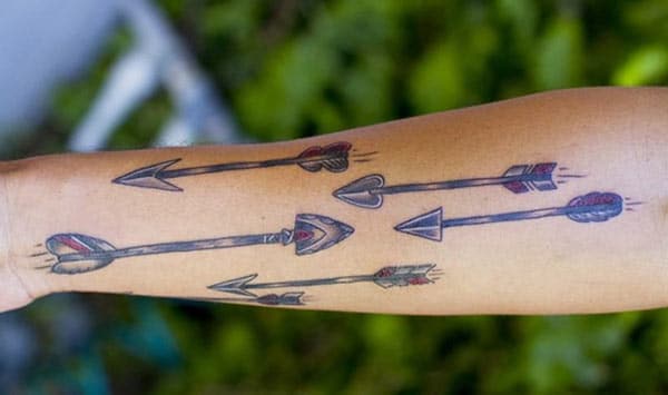 Arrow Tattoo on the lower arm makes a man look regal 
