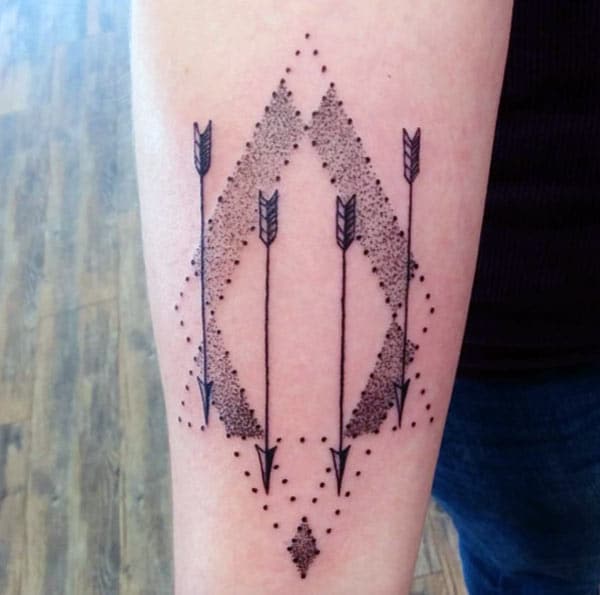 Arrow Tattoo on the lower front arm make beings the foxy look