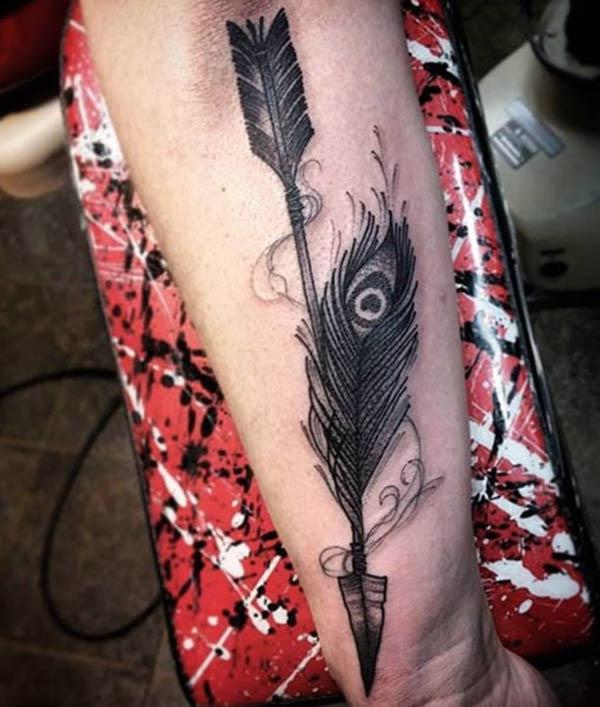 Arrow Tattoo on the back lower arm make a man look cool 