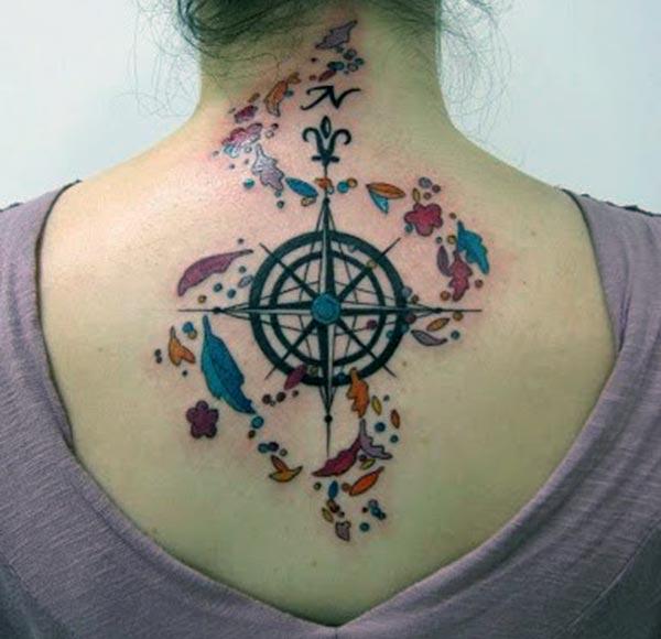 Compass tattoo on the back make women look pretty