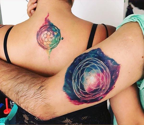 Couple Tattoos on the hand and the back brings the astonishing look
