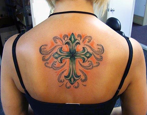 Cross tattoo at the back make girls appear gorgeous.