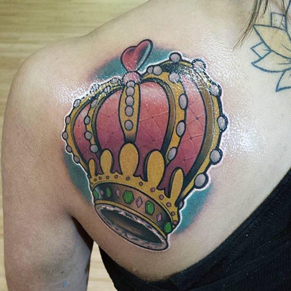 Girls love Crown tattoo with colorful design ink. This tattoo design make them look more charming