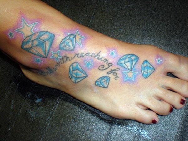Makes a divine diamond tattoo on foot to flaunt it