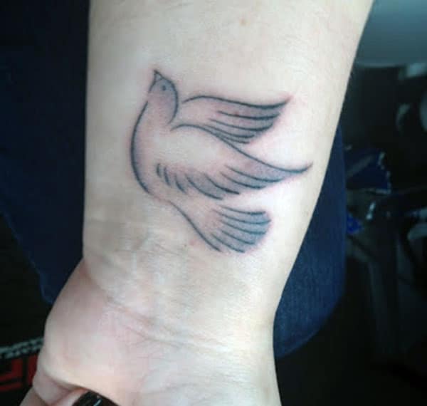 Dove Tattoo on the lower arm makes a man look cute
