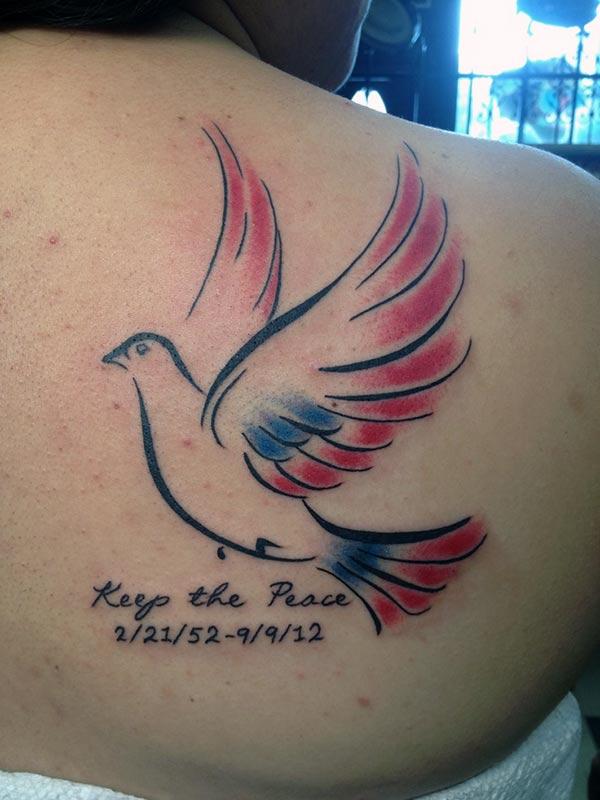 Dove Tattoo on the back brings the radiant look in girls