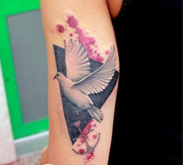 Dove Tattoo on the lower arm makes a lady look exquisite