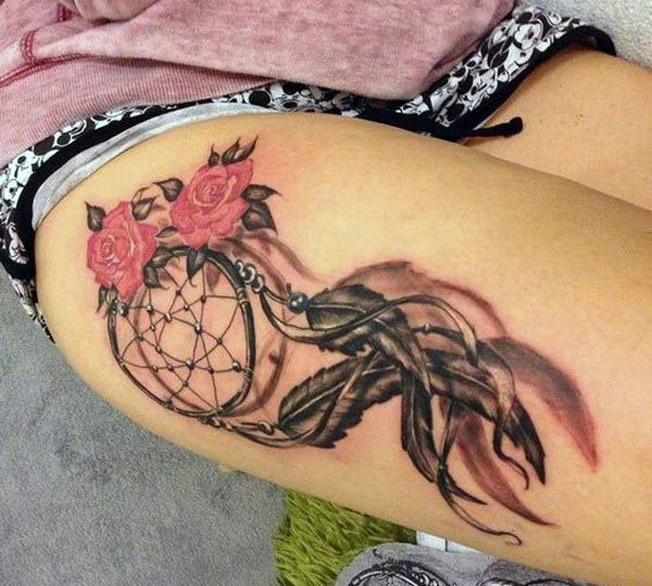 Dreamcatcher tattoo on the side thigh gives the girls an attractive look