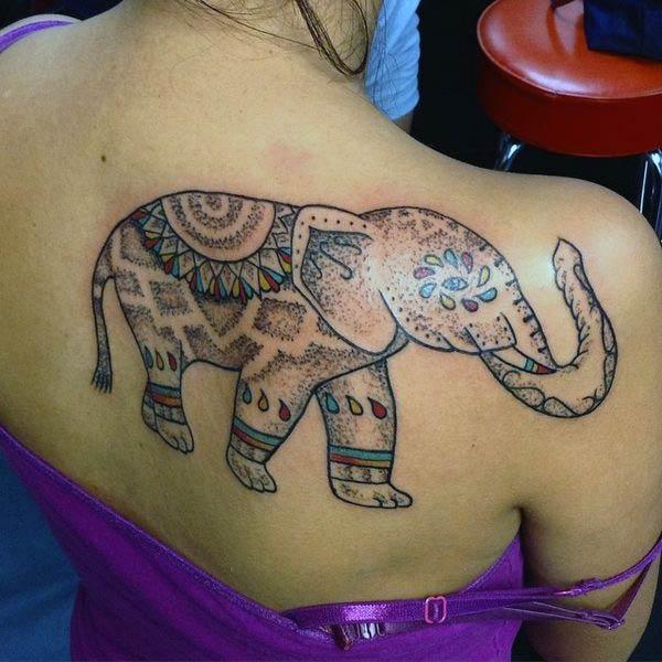 Elephant tattoo with a brown ink design make them look pretty