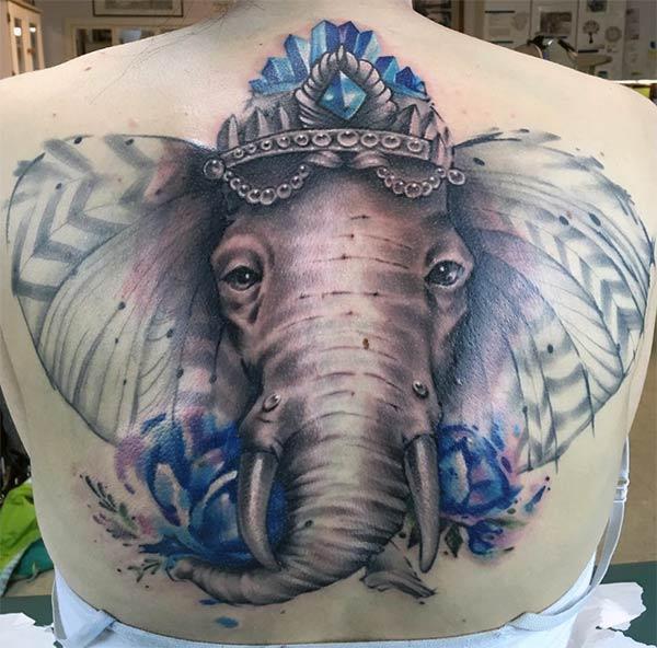 Elephant tattoo on the back brings the radiant look in girls