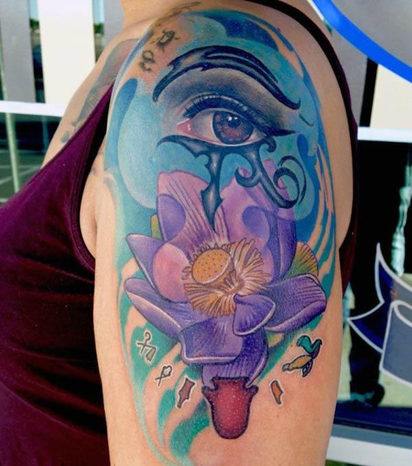 Eye tattoo for the shoulder gives the captive look in girls