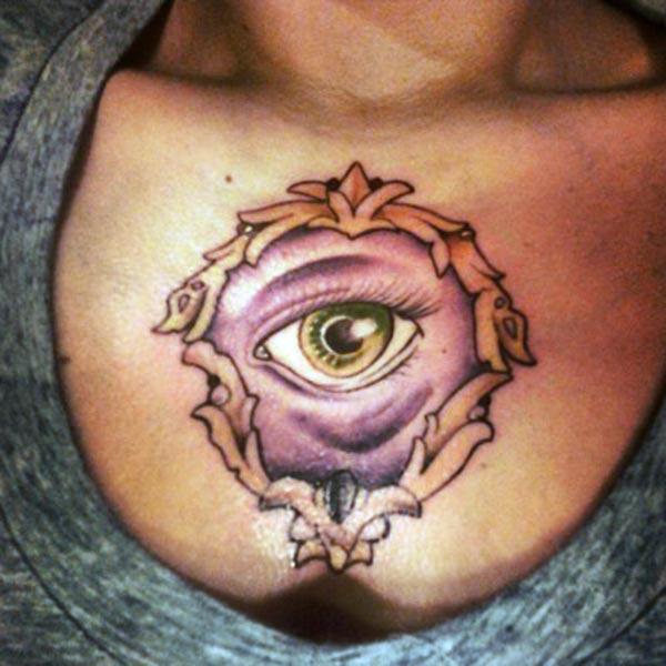 Eye tattoo with a pink ink design make them look pretty