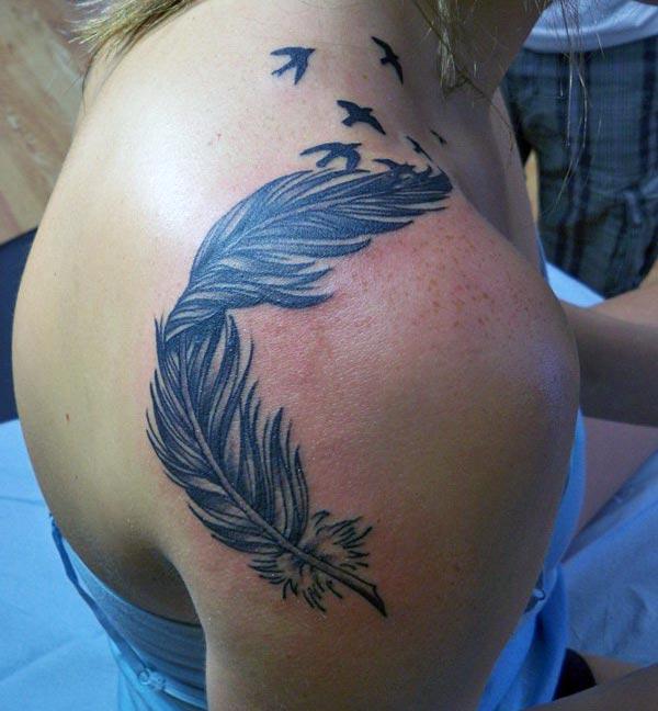 Feather tattoo with a black ink design make them look marvelous