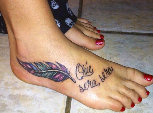 Makes a divine Feather tattoo on foot to flaunt it
