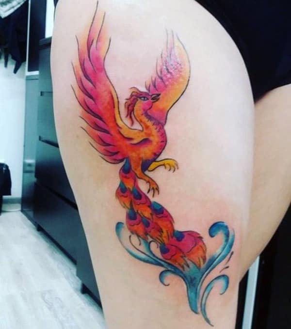 Phoenix tattoo on the side thigh gives the girls an attractive look