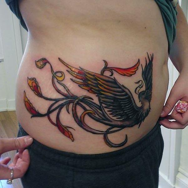 Phoenix tattoo for the side gives the captive look in girls