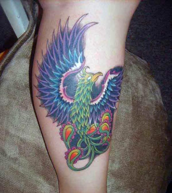 The bright design ink of the Phoenix tattoo on the foot matches the skin color give a man a dapper look