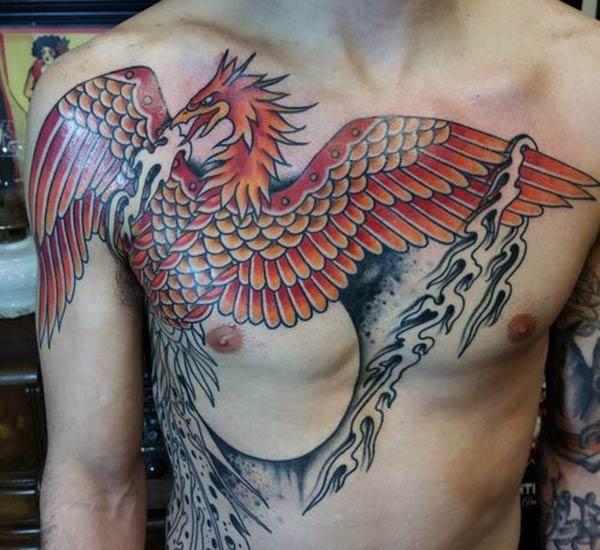 The Phoenix tattoo on the upper chest with a brown ink design make a man look comely