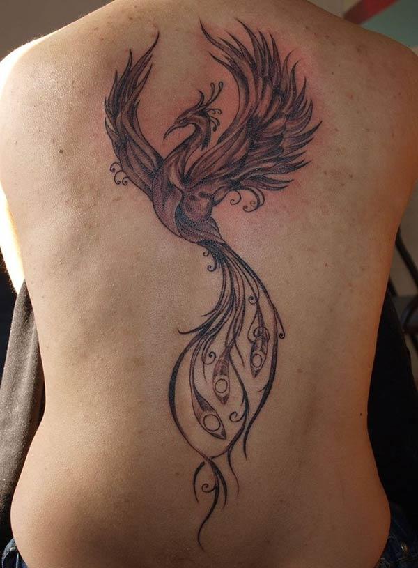 Phoenix tattoo at the back brings the captivating look