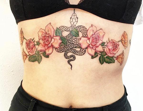 Snake Tattoo on the upper belly brings the astonishing look in girls.