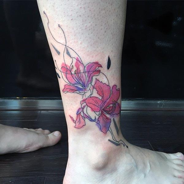 Flower Tattoo for men with pink ink design make them look foxy