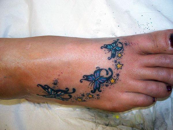 Foot Tattoo for girls with a butterfly design brings their artful appearance