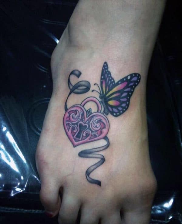 Foot tattoo with a butterfly design on the leg brings the captivating look