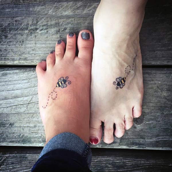 Friendship tattoo on the foot with a bee design brings the pretty look
