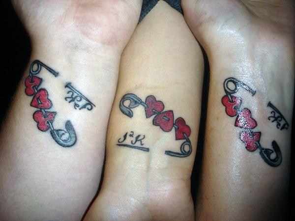 Friendship tattoo on the wrist with a pink love design make people appear charming