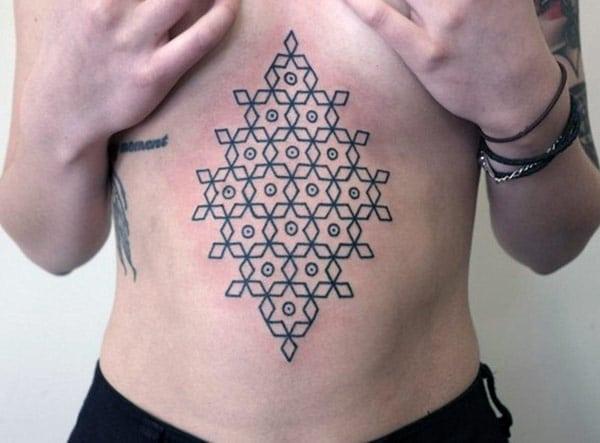 Geometric tattoo for Women with a black ink design make them look lovely