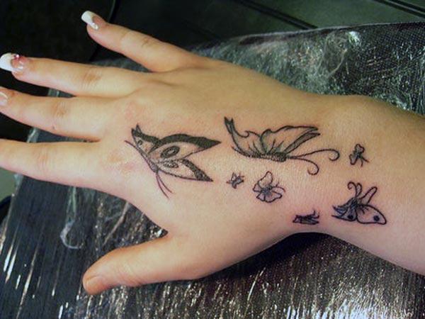 Hand tattoo with black ink design make it more captivating