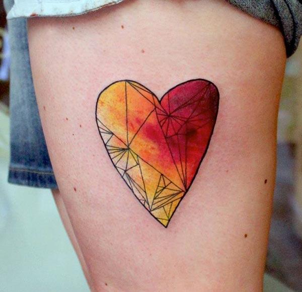 Heart Tattoo for the side thigh brings their feminist look.