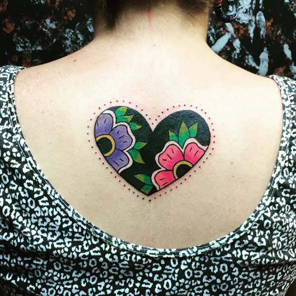 Heart Tattoo for Women with a mixture of black, pink and green ink design makes them look adorable