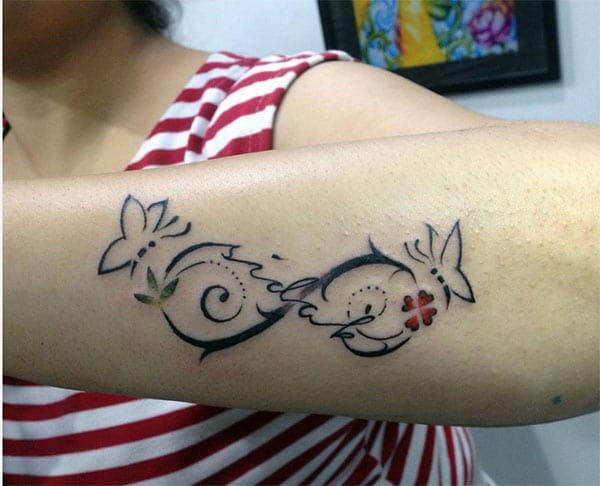 Infinity Tattoo for Women with a flower makes them look sexy