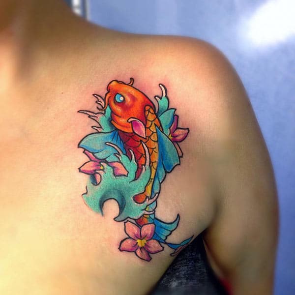 Koi Fish Tattoo for Women with orange and yellow ink design make them look adorable