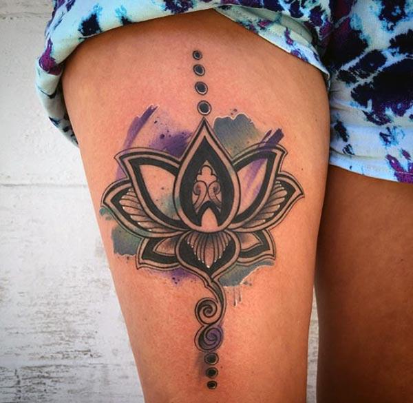 Lotus Flower tattoo on the side thigh brings the feminist look