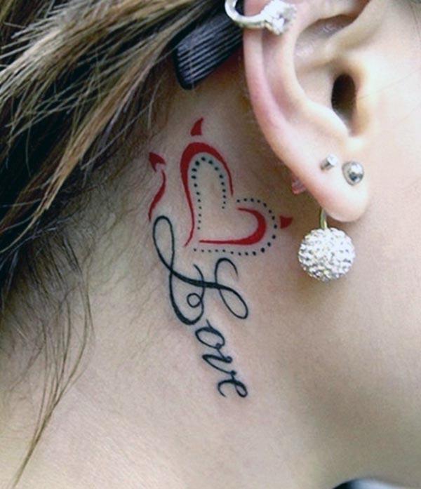 Love tattoo behind the ear brings the feminist look