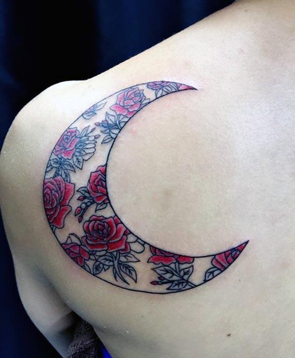 Moon tattoo with pink ink, flower design brings a gorgeous look