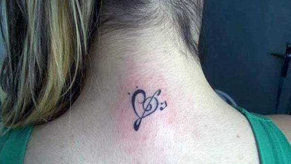 Music Tattoo on the back neck of ladies make them look attractive