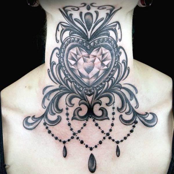 Neck tattoo with a black ink design makes a lady look captivating 