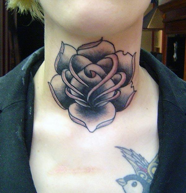 Neck tattoo with a flower design brings the captivating look