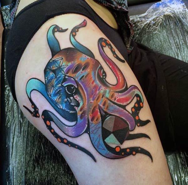 Octopus Tattoo for the upper thigh brings their feminist look.