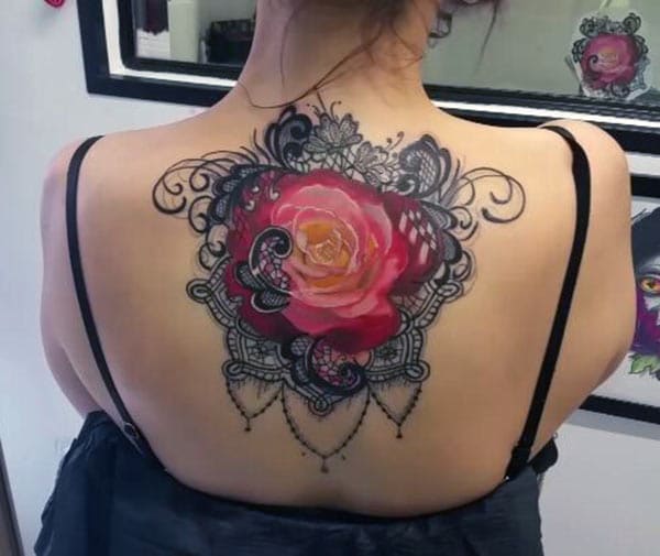 Rose Tattoo with pink ink design on the back brings a gorgeous look