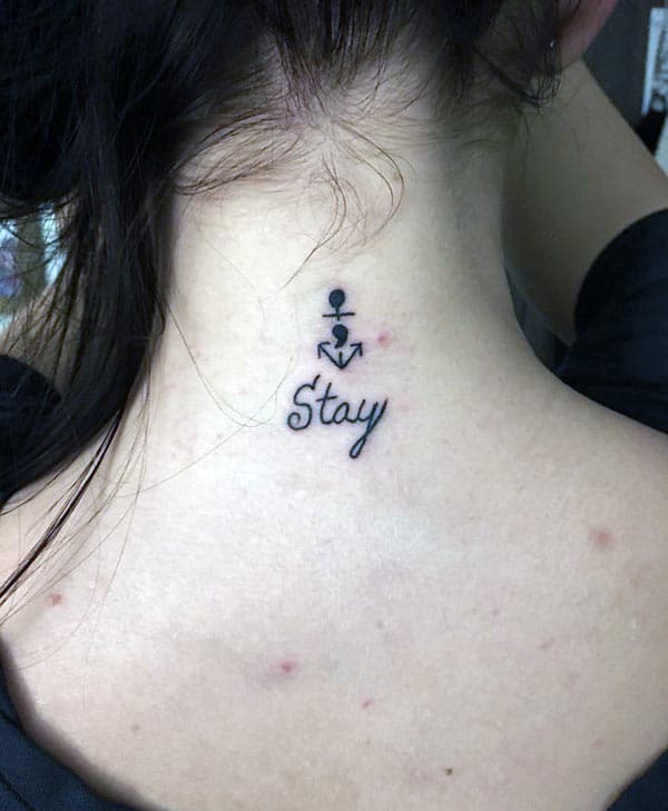 Semicolon tattoo with black ink design brings a gorgeous look