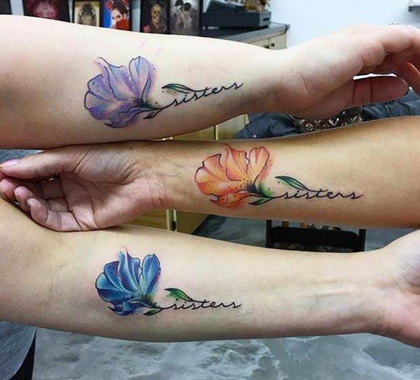 Sister Tattoo on the lower arm make sisters look stylish