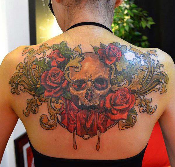 Skull Tattoo on the back makes a women look attractive